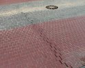 Тротуарная плитка по ул. Ленина, уложенная летом 2016 г. после зимы просела и образовались трещины. Плитка на клумбах после зимы в большинстве мест раскрошилась или отвалилась