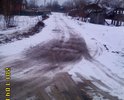 Этот участок дороги отремонтирован за счет жителей, городская техника здесь только снег чистит.