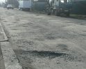 Ужасное состояние проезжей части дороги по ул Забалуева на участке от 1-го до 12-но переулков Порт-Артурских.тротуары отсутствуют. Дорога вся разбита.
