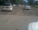 Неудовлетворительное состояние дорожного полтона на перекрестке улиц Ярыгина и Крылова.