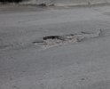 На улице Лермонтова, На пр. Кулакова мной уже более 10-ти дней наблюдается повреждение дорожного покрытия в виде ямы, размеры которой превышают нормативно допустимые.