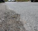 На улице Народная, На пр. Кулакова мной уже более 10-ти дней наблюдается повреждение дорожного покрытия в виде ямы, размеры которой превышают нормативно допустимые.