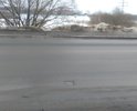 Переулок Челышева, в прошлом году забыли заделать дыры от взятых контрольных проб покрытия, целостность покрытия нарушена, ждем образования очередной ямы на новой дороге.