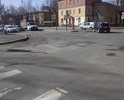 Повреждения дорожного покрытия проезжей части на перекрестке улицы Крупской и улицы Бабушкина