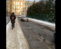 Проезд вдоль общежития на Маршала Конева 14 уже 3 года находится в ужасном состоянии, проезжающие мимо автомобили дребезжат по ямам и шумят по ночам