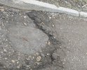 на участке дороги от пересечения улиц Юбилейная и Советская большое количество ям, фактически вся дорога представляет собой одну большую яму.