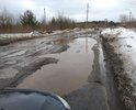 Проезд Колесникова, вся дорога - серия ям глубиной до 1/3 диаметра колеса легковушки