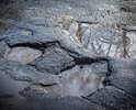 Весь участок дороги от перекрестка ул. Чапаева-Конституции, через ж-д переезд и по всей ул.2-й Гвардейской Армии покрыт выбоинами и волнообразными образованиями. Особенно перекрестки и сам ж-д переезд.