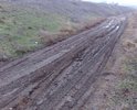 Добрый день! Обращаемся к Вам по поводу отсутствия дороги на наших улицах. Дело в том, что на них абсолютно отсутствует какое либо дорожное покрытие. В результате, все жители наших улиц: Черниговская и 1-го Мая, пгт. Приморский, г. Феодосия, в осенний, зимний и весенний период (дождей и холодов) просто утопают в грязи. На наших улицах проживают старики, которые ежедневно преодолевают до 2 километров туда и обратно к ближайшему магазину, дети, которым не то что негде играть, порой за пределы дворов выйти не возможно. А ведь им каждое утро еще и в школу нужно ходить. Представьте в каком виде ребенок приходит в школу? Данная ситуация еще усугубляется тем, что начиная от дома 24 по улице Черниговская и до пересечения с улицей 1-го Мая, примерно 300 метров, на улице полностью отсутствует освещение. По вечерам в кромешной тьме, мы возвращаемся с работы по колено в грязи. В бесчисленных ямах и колдобинах владельцы автомобилей разбивают подвеску на своих авто, ремонт которых стоит нам не малых денег. Мы регулярно своими силами подсыпаем на дорогу щебень, но он бесследно утопает в грязи. В добавок ко всему, по улицам: Черниговской и 1-го Мая, периодически ездит тяжелая техника: самосвалы, трактора, а порой фуры и автобусы. После них проехать и летом становится невозможно. Люди вынуждены ходить по остаткам насыпи от железной дороги, но из-за отсутствия освещения и обилия глубоких ям мы рискуем переломать ноги. Летом насыпь обрастает травой с острыми колючками и шипами и ее никто не убирает.
В связи с выше изложенным просим Вас помочь нам достучаться до властей города, чтобы они приняли меры для приведения наших улиц в надлежащее состояние. В настоящий момент мы собираем подписи жителей наших улиц для обращения к Главе МКУ «Приморская поселковая администрация 
Администрации города Феодосии Республики Крым» Шевченко И.А.