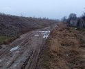 Добрый день! Обращаемся к Вам по поводу отсутствия дороги на наших улицах. Дело в том, что на них абсолютно отсутствует какое либо дорожное покрытие. В результате, все жители наших улиц: Черниговская и 1-го Мая, пгт. Приморский, г. Феодосия, в осенний, зимний и весенний период (дождей и холодов) просто утопают в грязи. На наших улицах проживают старики, которые ежедневно преодолевают до 2 километров туда и обратно к ближайшему магазину, дети, которым не то что негде играть, порой за пределы дворов выйти не возможно. А ведь им каждое утро еще и в школу нужно ходить. Представьте в каком виде ребенок приходит в школу? Данная ситуация еще усугубляется тем, что начиная от дома 24 по улице Черниговская и до пересечения с улицей 1-го Мая, примерно 300 метров, на улице полностью отсутствует освещение. По вечерам в кромешной тьме, мы возвращаемся с работы по колено в грязи. В бесчисленных ямах и колдобинах владельцы автомобилей разбивают подвеску на своих авто, ремонт которых стоит нам не малых денег. Мы регулярно своими силами подсыпаем на дорогу щебень, но он бесследно утопает в грязи. В добавок ко всему, по улицам: Черниговской и 1-го Мая, периодически ездит тяжелая техника: самосвалы, трактора, а порой фуры и автобусы. После них проехать и летом становится невозможно. Люди вынуждены ходить по остаткам насыпи от железной дороги, но из-за отсутствия освещения и обилия глубоких ям мы рискуем переломать ноги. Летом насыпь обрастает травой с острыми колючками и шипами и ее никто не убирает.
В связи с выше изложенным просим Вас помочь нам достучаться до властей города, чтобы они приняли меры для приведения наших улиц в надлежащее состояние. В настоящий момент мы собираем подписи жителей наших улиц для обращения к Главе МКУ «Приморская поселковая администрация 
Администрации города Феодосии Республики Крым» Шевченко И.А.