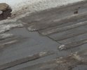 Напротив дома Фурманова д.25 проваливается асфальт.
