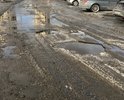 Главная объездная улица района. Ежедневный трафик состоящий из автобусов, маршрутных такси, самосвалов и других транспортных средств в купе с нашими морозам разбили, вдавили в землю асфальт по улице Кольцевой. Ремонта дорога не видела 7 лет. Несколько лет назад самые страшные дыры в асфальте пытались заделать "заплатками", но на дороге остался только щебень этих заплаток.