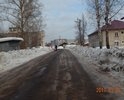 Эта улица из асфальтированной со временем превратилась в ямогравийную.