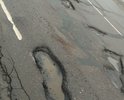 Здравствуйте. Очень глубокие ямы находятся на перекрестке,на повторение на Обьездное шоссе!После моста и на мосту кстати тоже есть,но там не сфотографировать.Водители пытаются объехать ямы,что может привести к аварийной ситуации,но и ехать по ним не возможно! Подскажите как загрузить несколько фотографий по данному участку?