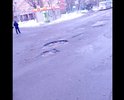 Каждую весну появляются все новые и новые ямы, которые не представляется возможным объехать. Длина некоторых ям превышает 50 см, а глубина - 20 см. Проезжающие машины каждый раз обливают пешеходов, идущих по тротуару. Просьба - решить данную проблему.