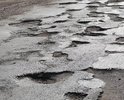 На всем протяжении участка нормального покрытия всего метров триста. Остальное сплошной слалом. А с каждым годом ситуация усугубляется! И это часть дублера пр. Гагарина..