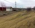 Эта дорога имеет достаточно важное значение, она связывает частный сектор с многоквартирными домами. По ней ежедневно едут множество машин и дети ходят в школы и детсады. На фото видно, какая там грязь и большие лужи с ямами. И так люди каждый день должны ходить. Её необходимо покрыть асфальтом, но для начала можно заделать какие-то большие ямы где лужи).