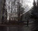 разбитая проезжая часть на пр-де Светлый между домами №3 и №13