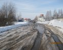 Нечищеная грунтовая дорога с огромными лужами