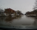 Улица Попова, множество ям- очень глубоких, скрытых под водой.