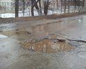 Лишь одна из миллиона ям, где асфальт вылетает кусками размером с кирпич.