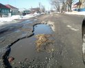 На протяжении всей ул. Тамбовской огромные ямы, размер уоторых многократно превышает установленные ГОСТом параметры.