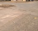 Ямы на выезде с придомовой территории.