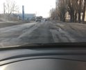 Полностью разбито дорожное полотно на всей улице, огромные ямы,  не соответствующие ГОСТ.