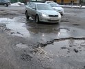 Дорога ведёт к школе № 10. Невозможно не только к школе за ребёнком подъехать, даже детям ходить в школу! Разбит весь съезд с ул. Комсомольской на Запольную и ул. Запольная у 10 школы. Там огромная яма и лужа во всю проезжую часть! Ямы глубиной до 30см!!!!