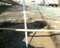 Огромная яма на Кокошкинском шоссе д. Зайцево Одинцовского района. Размер разрушения дорожного полотного 115*75*18 см. Расположена у начала отбойника в направлении от Минского шоссе в сторону пос. Кокошкино