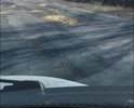 Дорога вся в ямах и трещинах