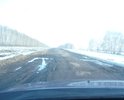 Дорога без какого либо покрытия. По этой дороге каждый день перевозят детей в соседнюю школу.