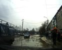 На ул. Лопатина не зная брода лучше не соваться. В неприметных лужах скрываются пробоины в полколеса.
