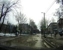 На ул. Лопатина не зная брода лучше не соваться. В неприметных лужах скрываются пробоины в полколеса.