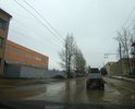 На срезах ям хорошо видна толщина асфальта - около 2 см.
