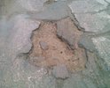 На этом участке высокая колейность дороги, сплошные ямы.