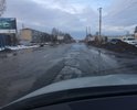 Одна из самых больших улиц города, постоянно в воде и ямах, скрывающих половину колеса легкового автомобиля.