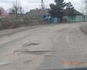 Одна из центральных улиц города, которая берет своё начало у въезда в город и ведет в центральную часть города.Состояние дорожного полотна видно на фотографиях. Скорость движения по этому участку не может превышать порой и 10 км/ч, так как если двигаться с разрешенной скоростью 60 км/ч, есть возможность не справиться с управлением, либо причинить вред т/с, а именно "убить"элементы подвески, погнуть диски, лопнуть шины и др. Ямочный ремонт является неэффективным и  решением проблемы лишь на некоторое время.