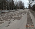Центральная улица города.  Состояние дорожного полотна видно на фотографиях. Движение по этому участку с разрешенной скоростью 60 км/ч, не исключает возможность не справиться с управлением, либо причинить вред т/с, а именно "убить" элементы подвески, погнуть диски, лопнуть шины и др. Ямочный ремонт является неэффективным средством решения данной проблемы, так как его результат заметен лишь некоторое время.