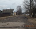 Второстепенная улица в центральной части города.  Состояние дорожного полотна видно на фотографиях.