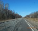 Качество дорожного покрытия трассы Р 133 видно на фотографиях. На асфальтном покрытии присутствуют ярко выраженные дефекты. Так же видно качество выполнения ямочного ремонта.