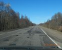 Качество дорожного покрытия трассы Р 133 видно на фотографиях. На асфальтном покрытии присутствуют ярко выраженные дефекты. Так же видно качество выполнения ямочного ремонта.
