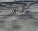 Сегмент дорожного полотна улицы Жуковского между улицами Луначарского и Гоголя имеет массу дефектов: ямы, выбоины, проваленные или чрезмерно возвышающиеся над плоскостью дороги канализационные люки.