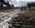 Отсутствует нормальная дорога в д. Панино (от дороги на д. Нестерово до маг Стройматериалы на дороге п. Панино). После дождей постоянно грязно, машины вязнут в глине и создают колеи, местами пешеходам вообще не пройти. В период весенне-осенней распутицы не проехать, не пройти,  Скорая помощь проехать не может. Глубокие ямы жители стараются засыпать строительным мусором - кирпичом, камнями, щебнем. На просьбу хотя бы  отсыпать дорогу (через Добродел) Администрация просто отписывается. Мы живём в 21 веке (первые упоминания о деревне с 1926г.)- а дорога до сих пор грунтовая!