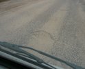 Верхний слой асфальта явно занижен, поэтому произошел ускоренный износ дороги. Необходимо ремонтировать и укладывать 5-6 см.