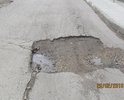 Проблема в отсутствие дорожного покрытия для нормального существования взрослых и детей. Остатки асфальта разрушает частная фирма двигаясь по улице 20 тонными автомобилями, а городским властям нет время на нас.