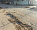 Огромные дыры сразу после пешеходного перехода и при выезде на ул З. Коноплянниковой от подстанции скорой помощи.