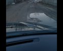 В черте города. Дороги давно уже нет. Зимой чистят один-два раза. Весной и осенью не пройти и не проехать.