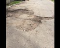 На участке ямы, которые объехать невозможно , сколько себя помню дорога в ужасном состоянии