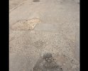 Разбитая дорога по которой машина ни едет , а ходит